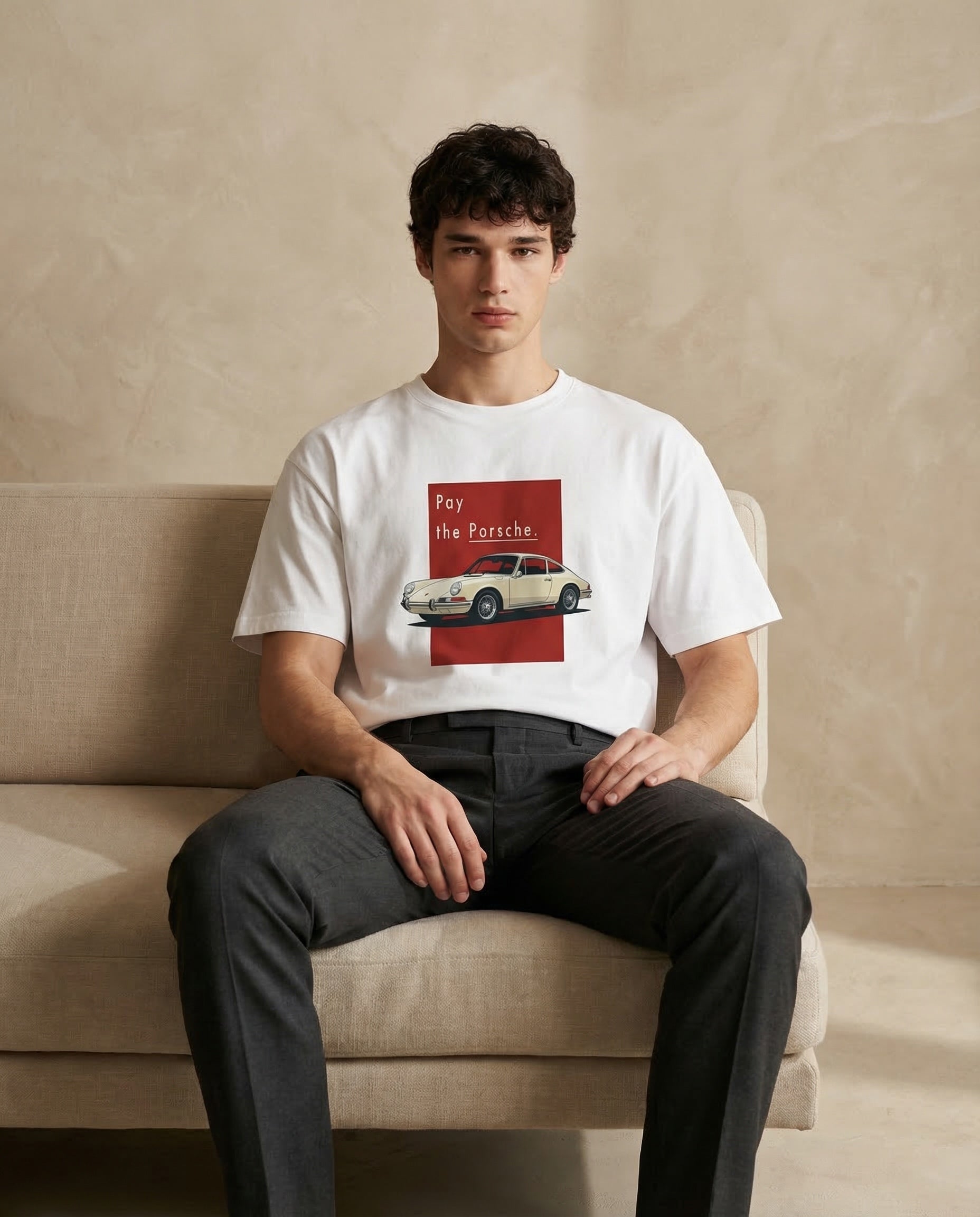 Unisex oversized "Pay the Porsche" print t-shirt by aurulu, featuring bold graphic design on soft cotton fabric.