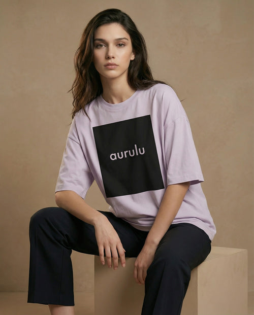 Aurulu women's oversized print T-shirt made from soft material, featuring a relaxed fit and stylish design on a plain background.