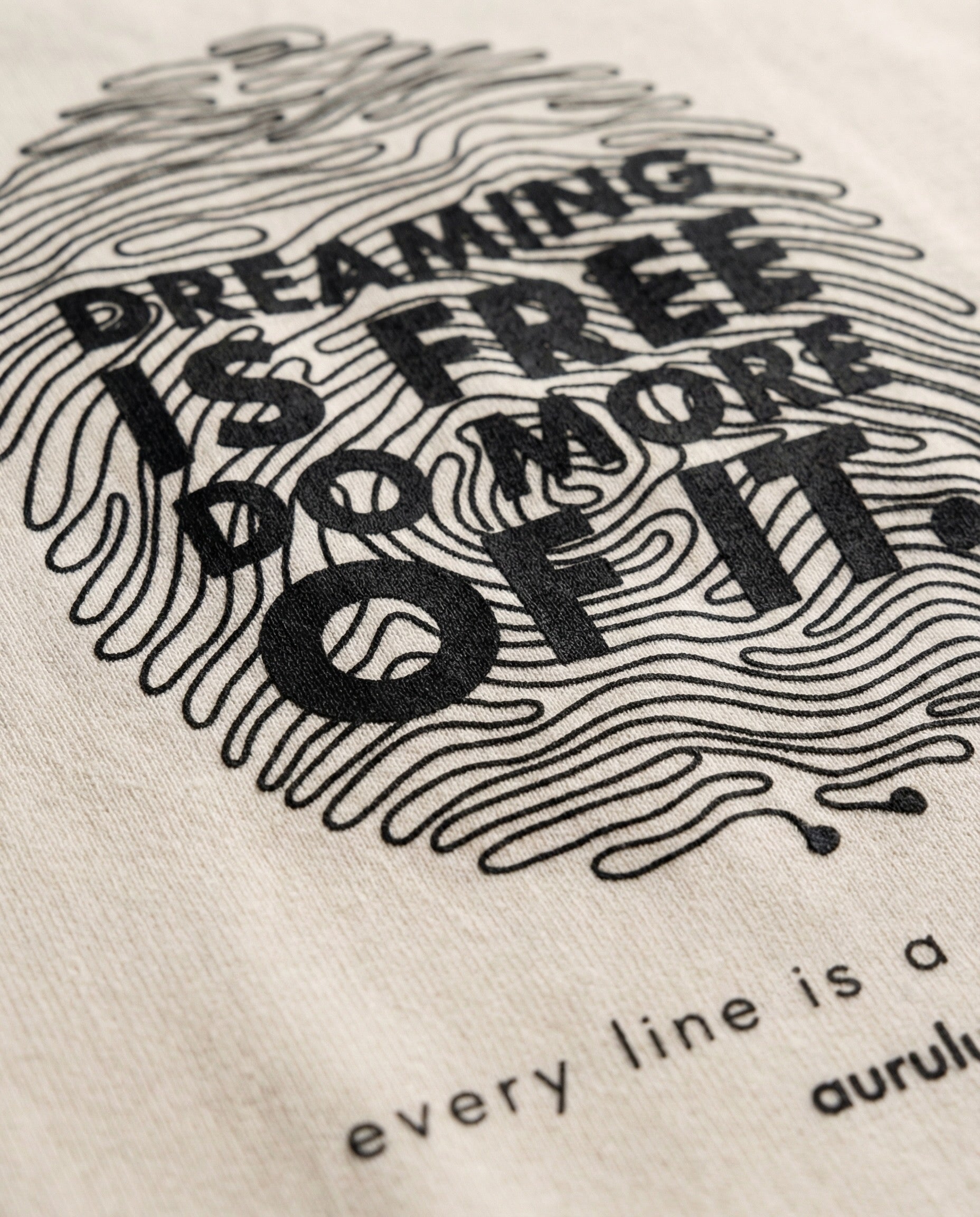 Aurulu women's oversized print tee made from soft material, featuring a relaxed fit and stylish graphic design.