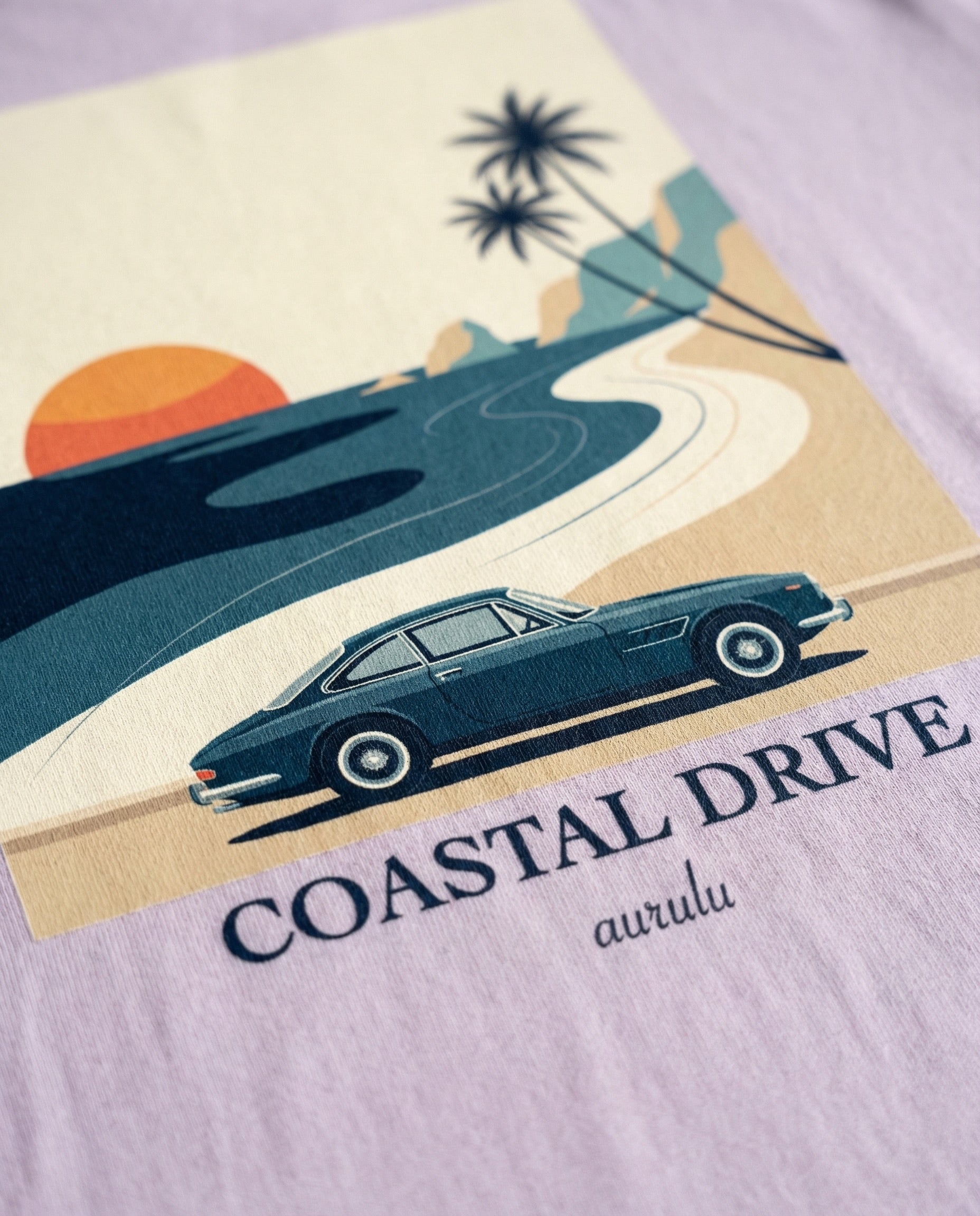 Aurulu Coastal Drive oversized men's T-shirt with print design, soft fabric material, casual fit, and coastal-themed graphic.