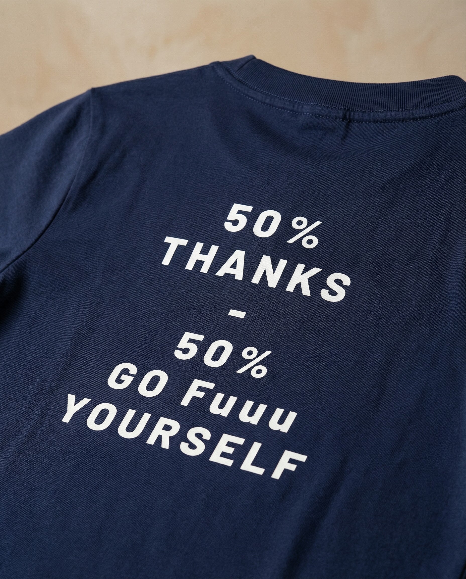 Men's 50% Thanks Duality statement tee by aurulu, featuring a printed design on soft fabric.