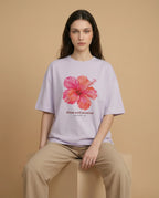 Aurulu Bloom With Intention women's oversized print tee featuring a floral design on soft fabric.