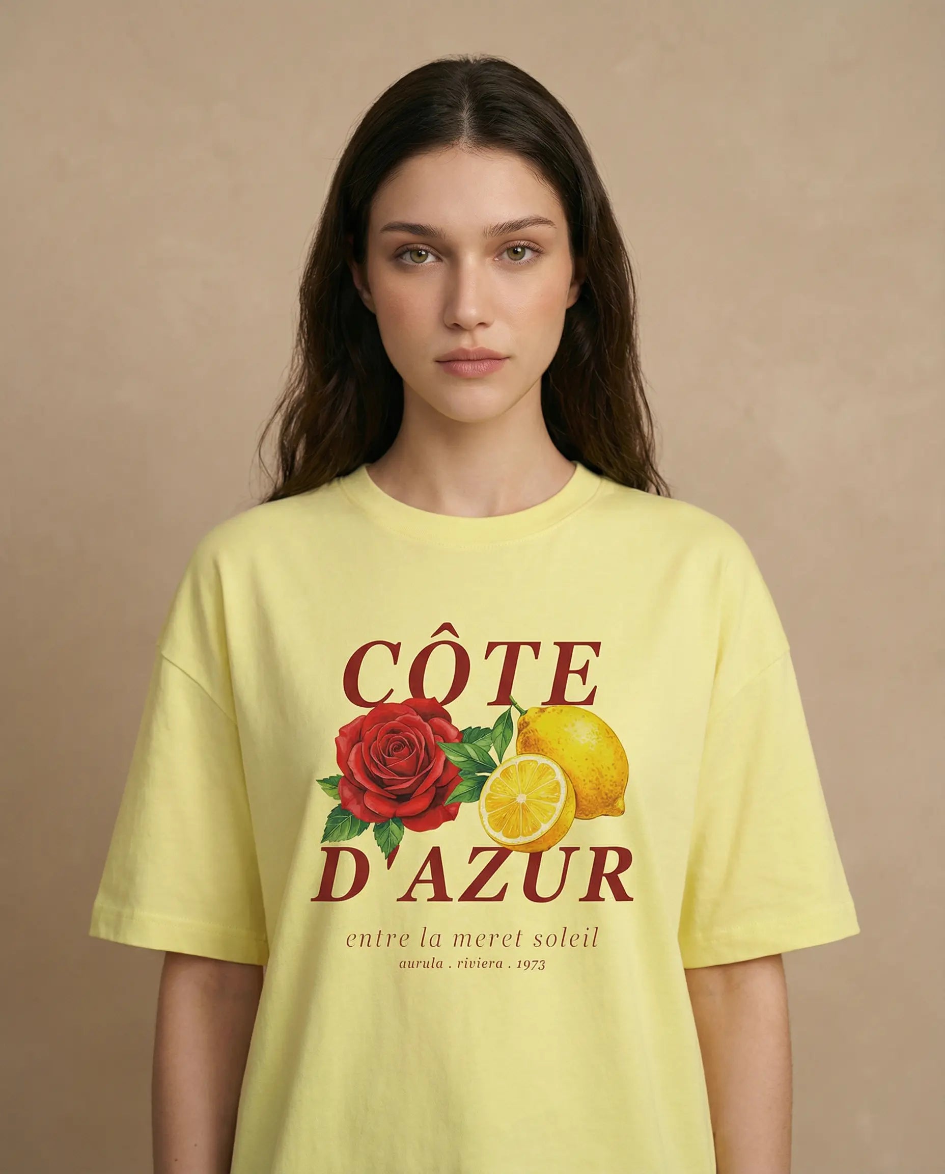 Côte d'Azur women's oversized tee with a colorful print, made by aurulu, shown in a close-up image highlighting the fabric and design.