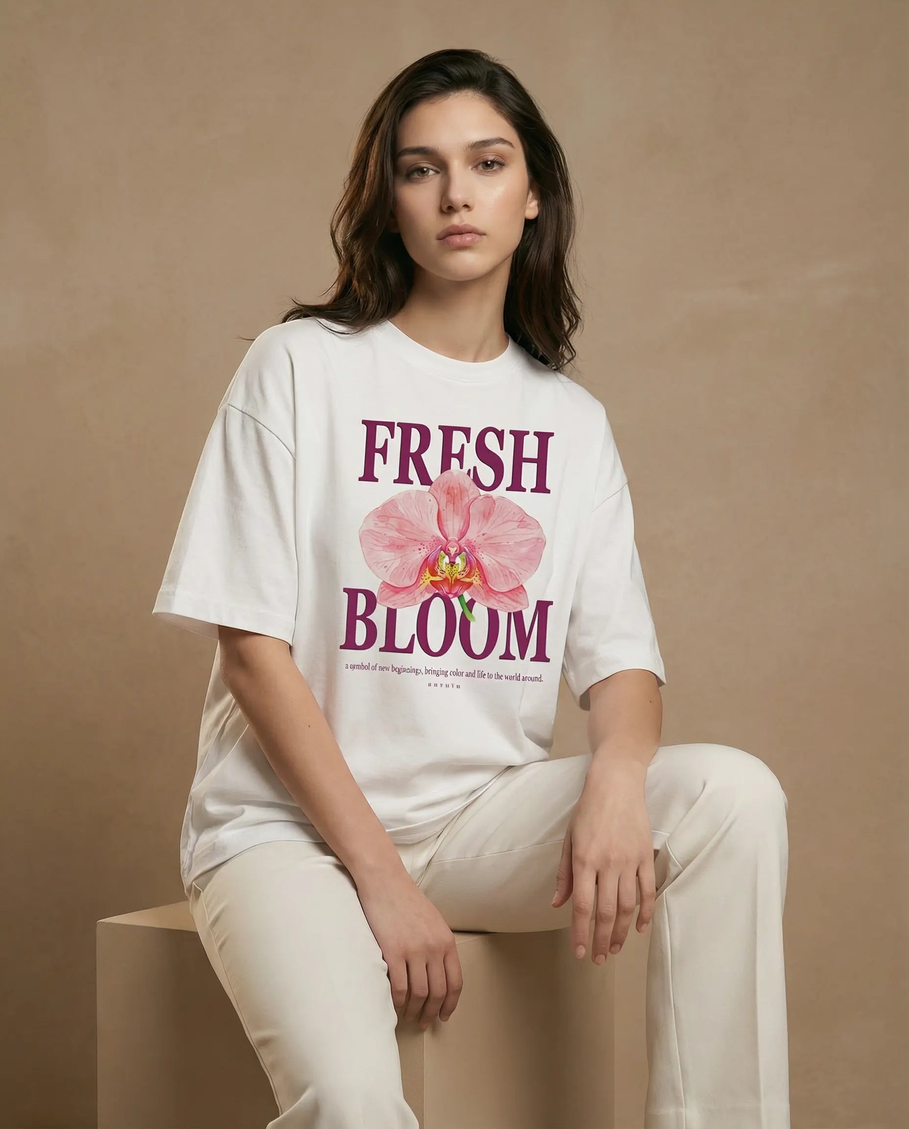 Fresh Bloom women's oversized tee with floral print, soft fabric and relaxed fit by aurulu, shown on a model.