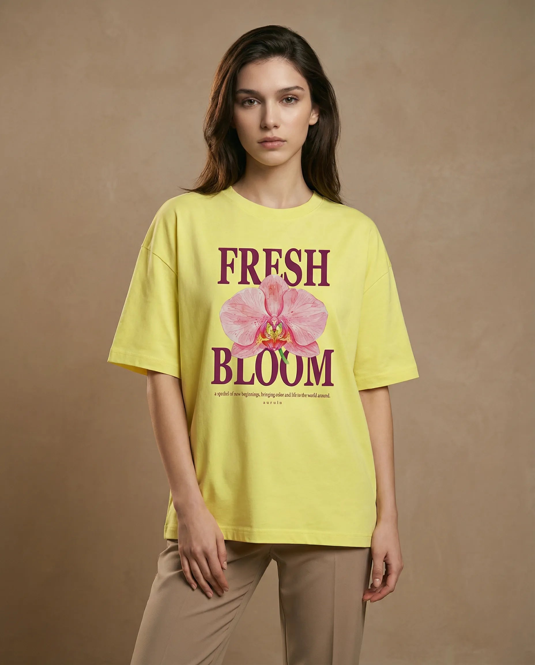Oversized women's tee by aurulu featuring a fresh bloom print on soft fabric, casual and stylish for everyday wear.