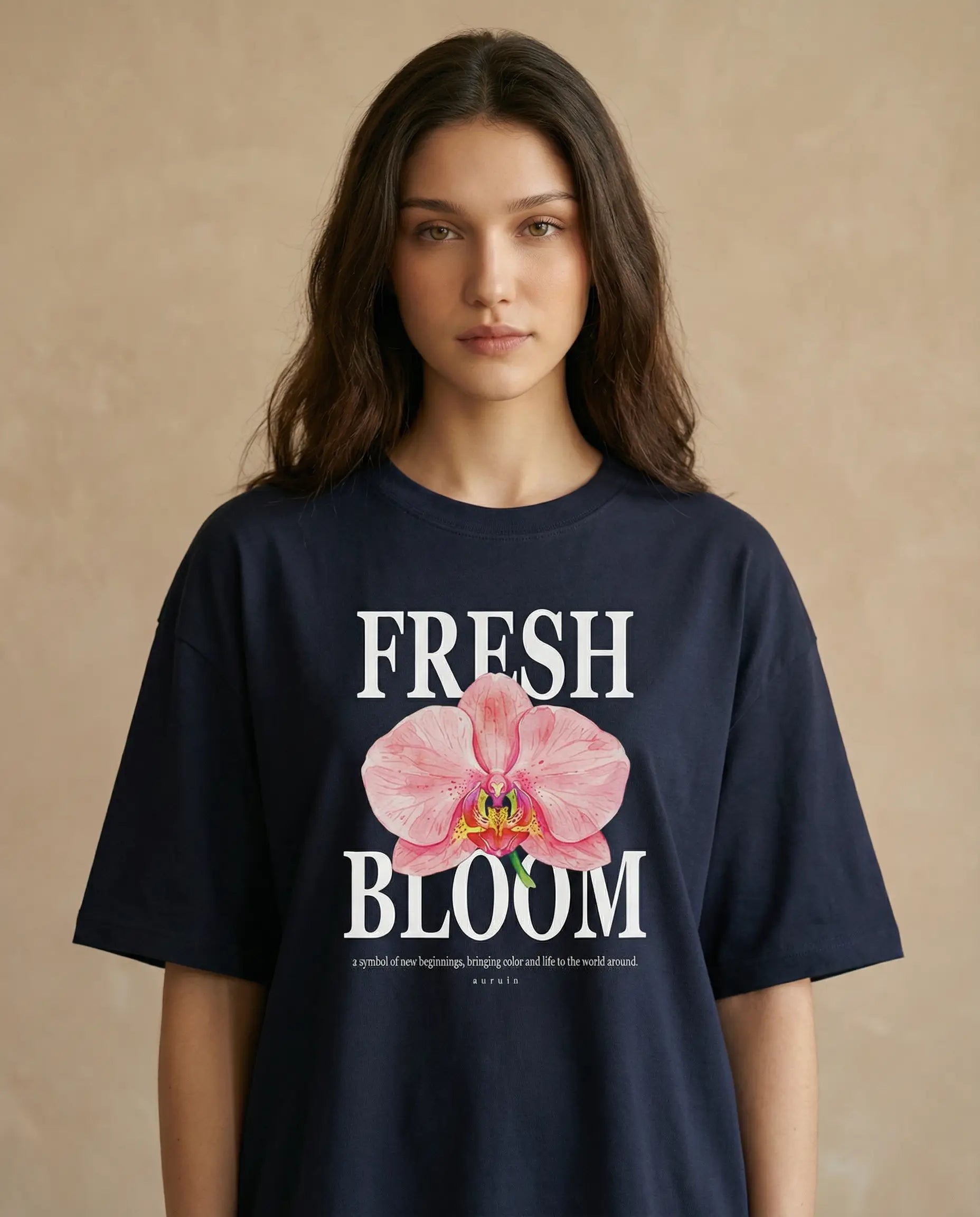 Fresh Bloom women's oversized tee with vibrant print design from aurulu, casual fit, shown laid flat.