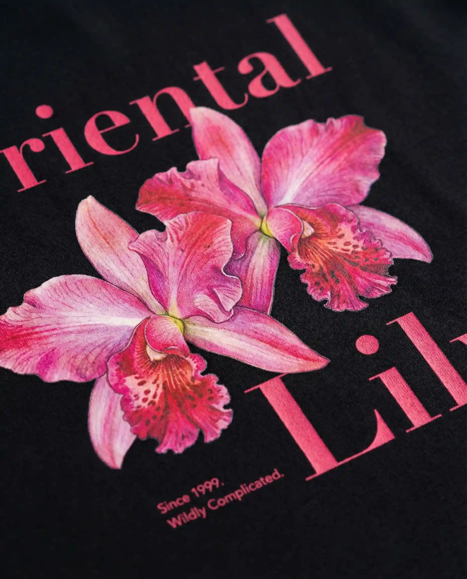 Oriental Lily women's oversized print tee by aurulu featuring a floral design on soft fabric.