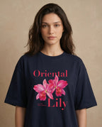Oversized women's t-shirt with Oriental Lily print by aurulu, featuring a comfortable, casual fit and floral design.