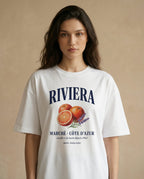 Print oversized women's tee by aurulu featuring Riviera Marché design, casual fit, and soft fabric for comfortable wear.