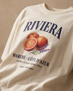 Aurulu Riviera Marché women's oversized tee with colorful print, casual fit, and comfortable fabric for everyday wear.