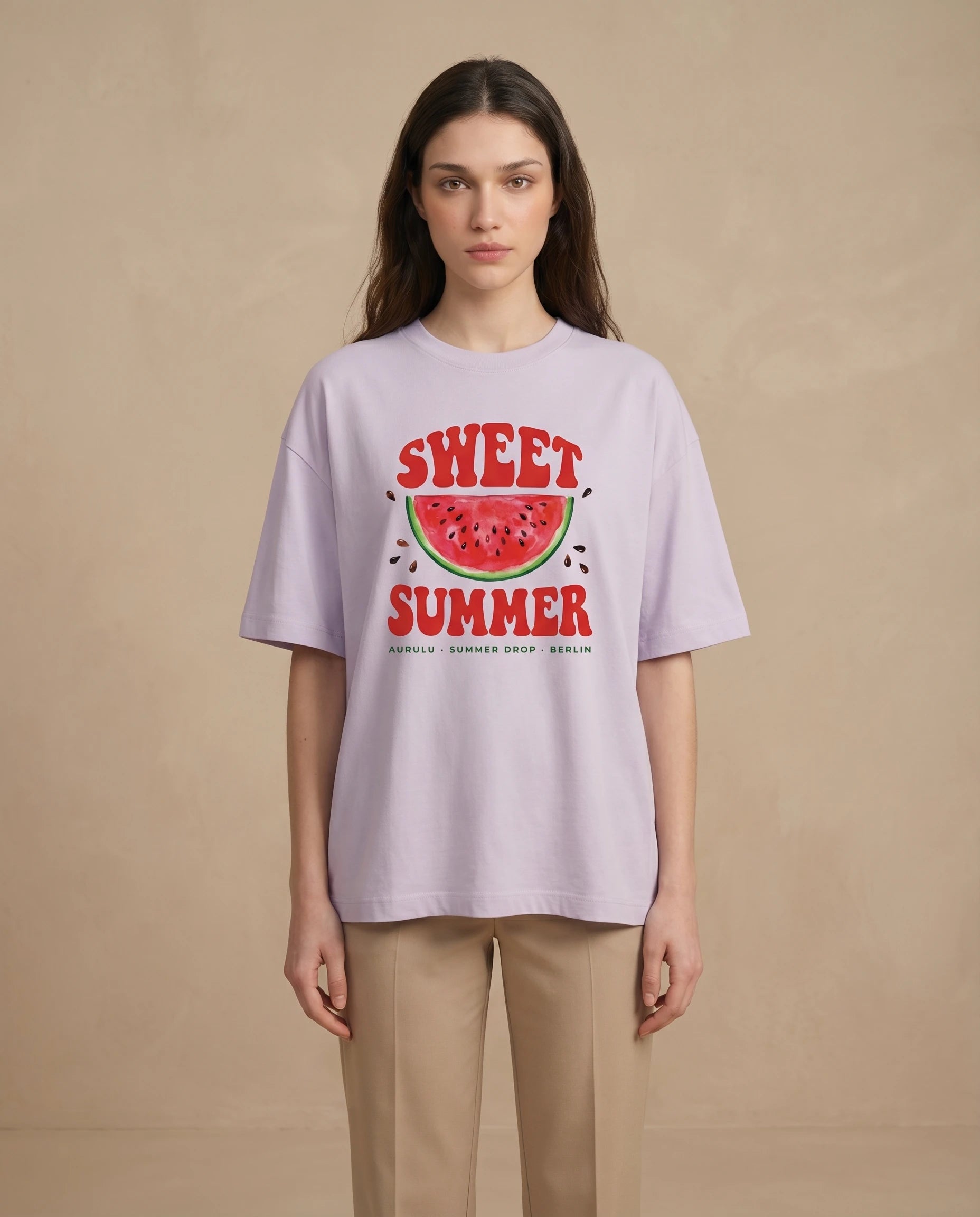 Sweet Summer women's oversized tee with colorful print design, made by aurulu, laid flat showing the relaxed fit and vibrant graphics.