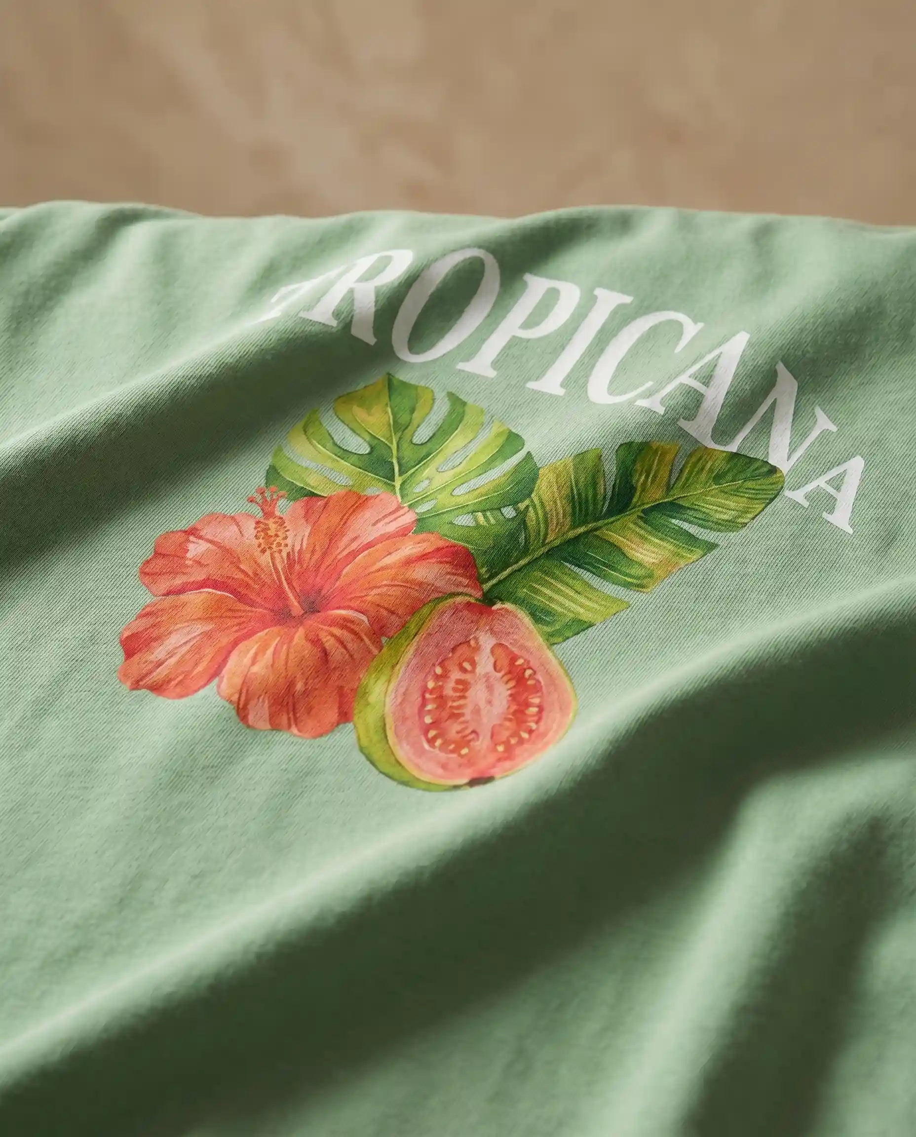 Tropicana women's printed tee by aurulu featuring colorful tropical fruit design on soft fabric.