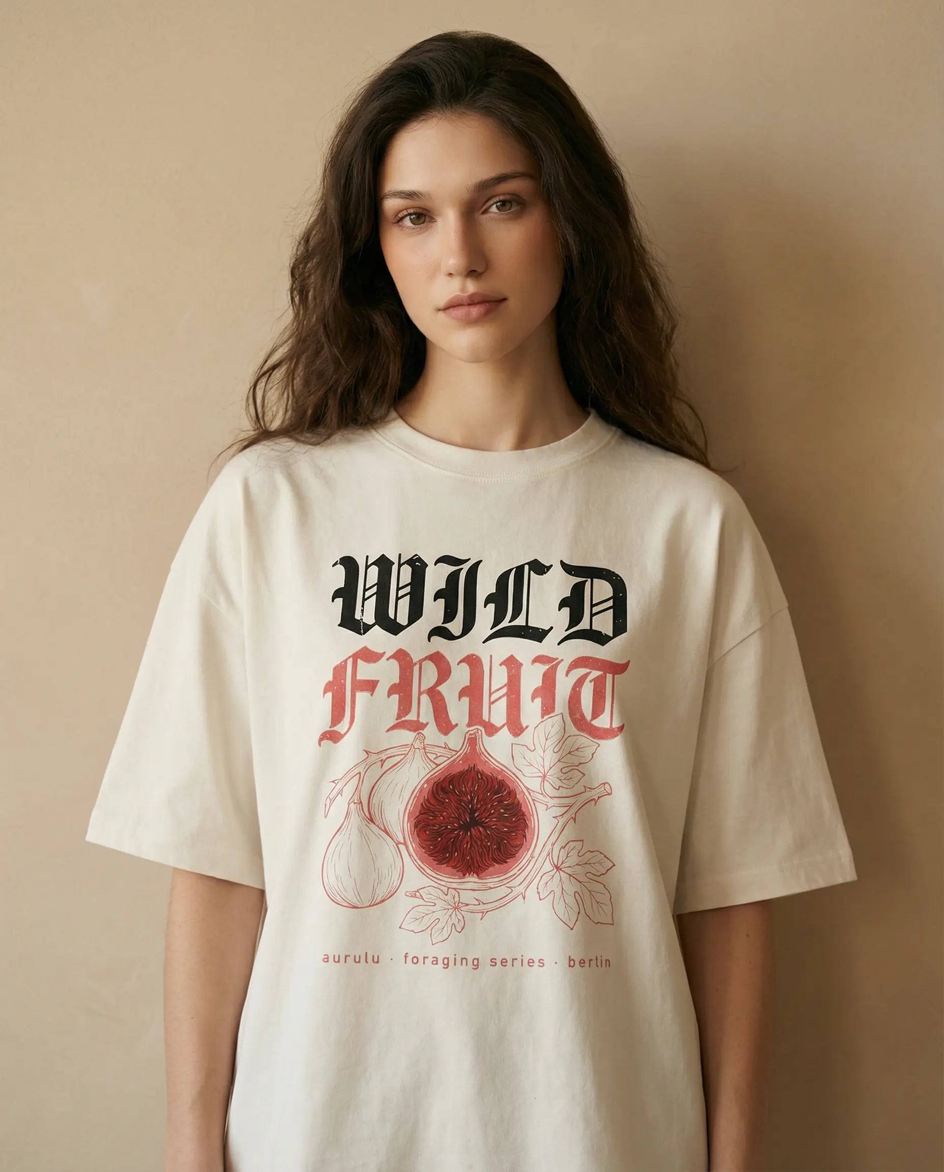 Wild Fruit Women's oversized print tee by Aurulu featuring a colorful fruit design on soft fabric.