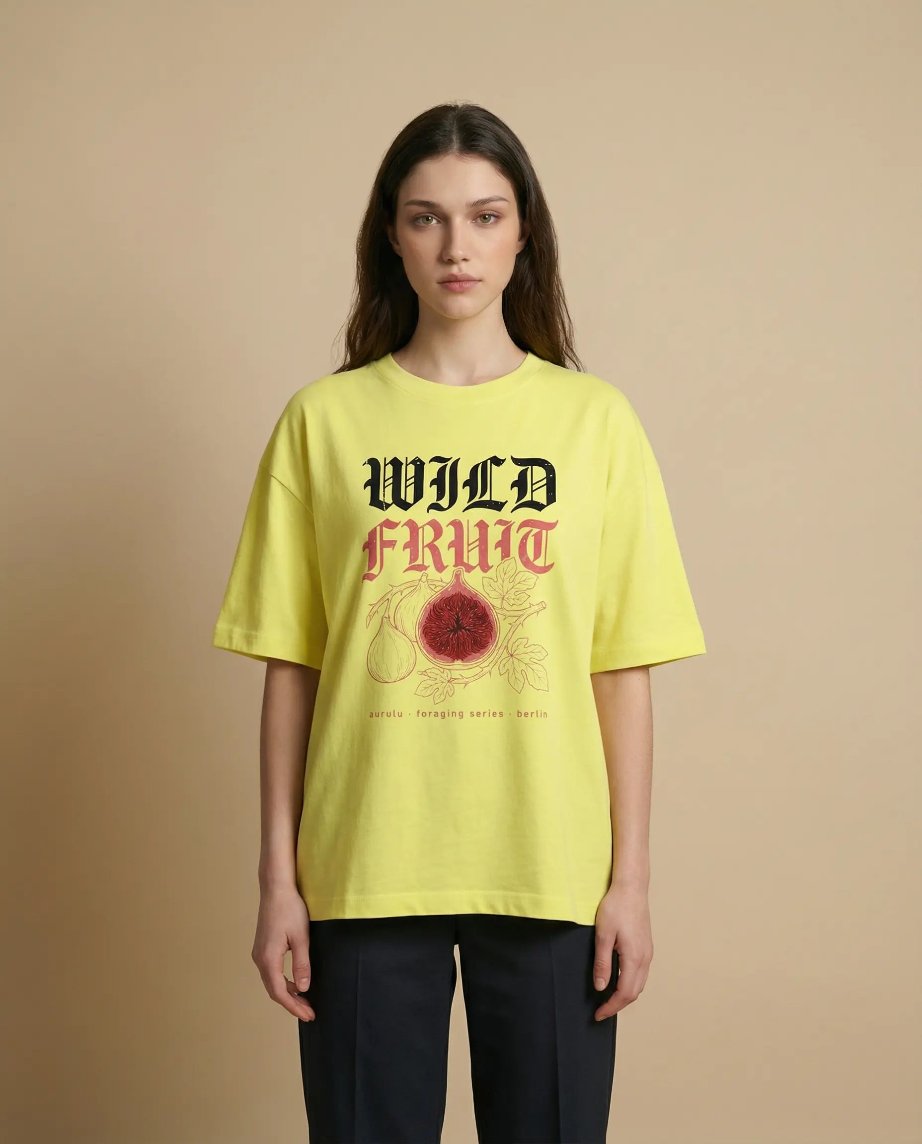 Wild Fruit women's oversized print tee by Aurulu featuring a colorful fruit design on soft fabric.