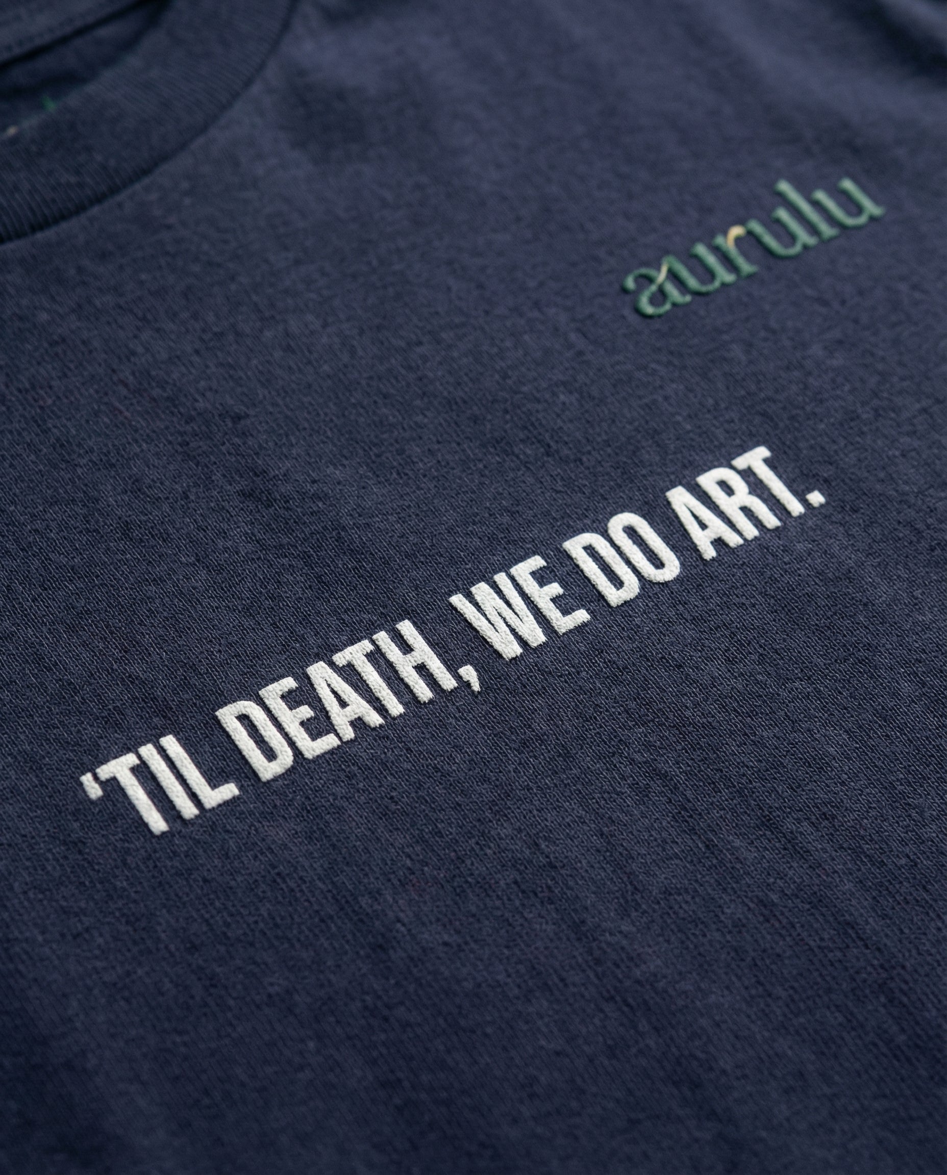 Women’s "We Do Art" print T-shirt by Aurulu, showcasing a stylish graphic design on soft fabric.