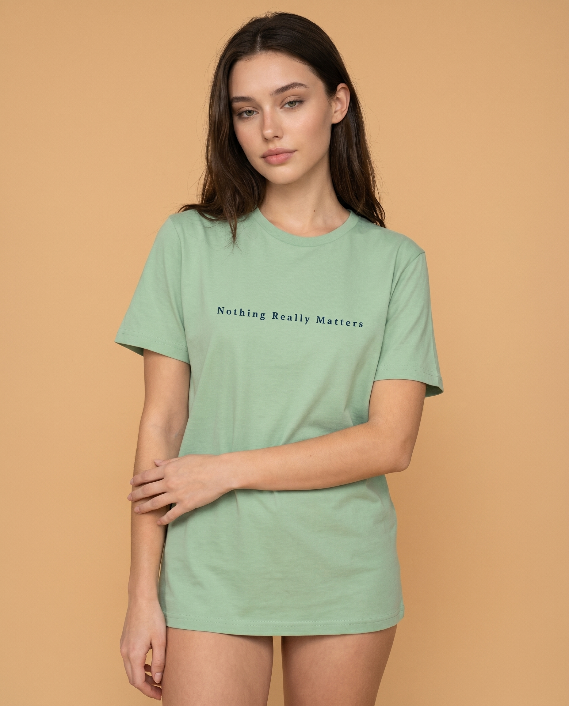 Unisex crewneck tee by Aurulu with printed design featuring the phrase "Nothing Really Matters But This Moment" on soft fabric.