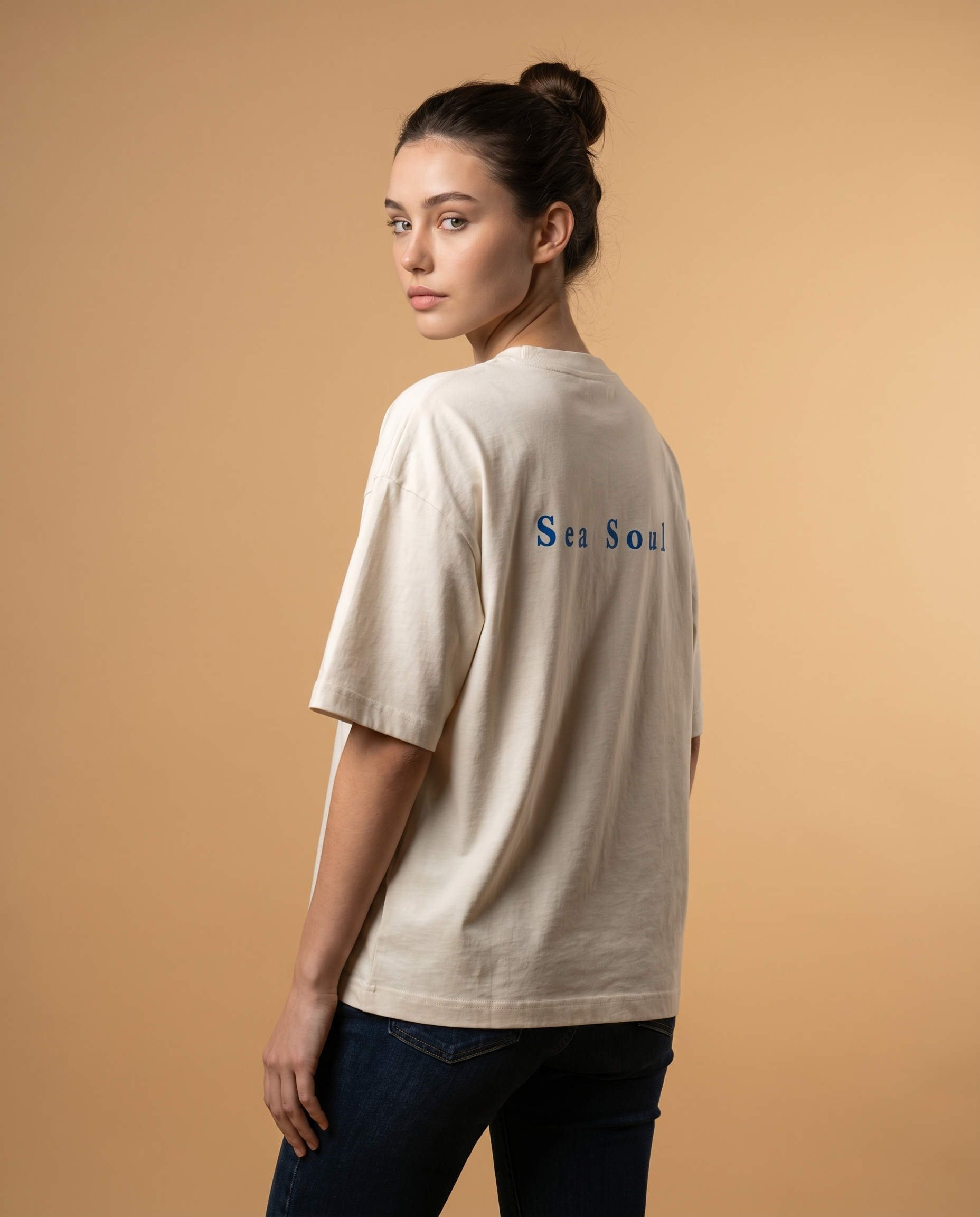 Sea Soul women's oversized tee by Aurulu featuring a vibrant print on soft fabric, displayed on a flat lay.