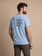 Unisex Training Season’s Over print T-shirt by aurulu made of premium cotton, featuring a stylish graphic design on the front.